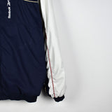 Vintage Reebok windbreaker track jacket tracksuit trackie jumper in white and blue with red stripes