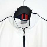 Vintage Nike tracksuit windbreaker jacket track longsleeve tee pullover sweatshirt in white with blue and red stripes.
