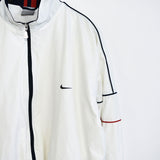 Vintage Nike tracksuit windbreaker jacket track longsleeve tee pullover sweatshirt in white with blue and red stripes.