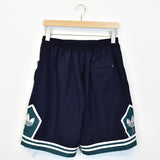 Vintage Adidas shorts joggers trousers track pants bottoms in dark blue and green