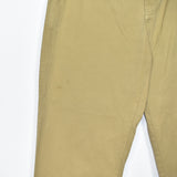 Vintage Tommy Hilfiger trousers joggers jeans pants in yellow/beige/light brown