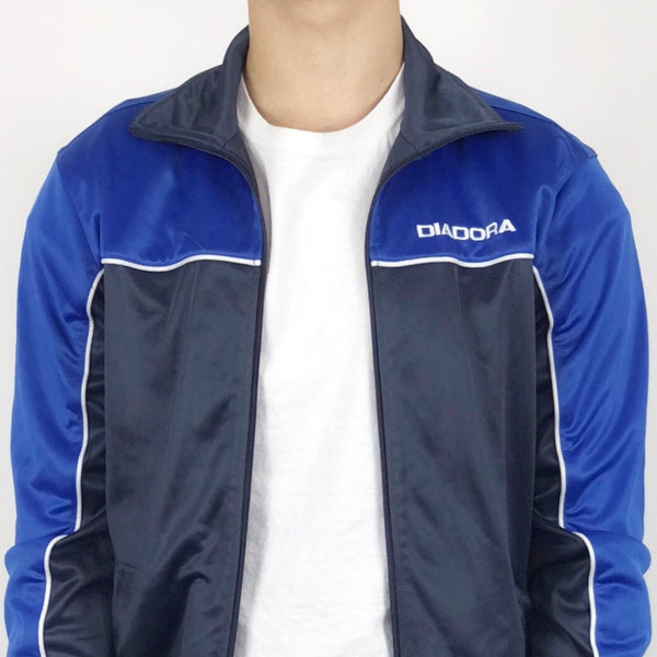 Vintage tracksuit trackie jacket zip up Diadora in blue and black