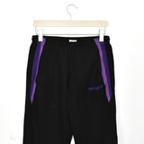 Vintage Umbro joggers trousers track pants bottoms in black and purple