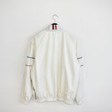 Vintage Nike tracksuit windbreaker jacket track longsleeve tee pullover sweatshirt in white with blue and red stripes.