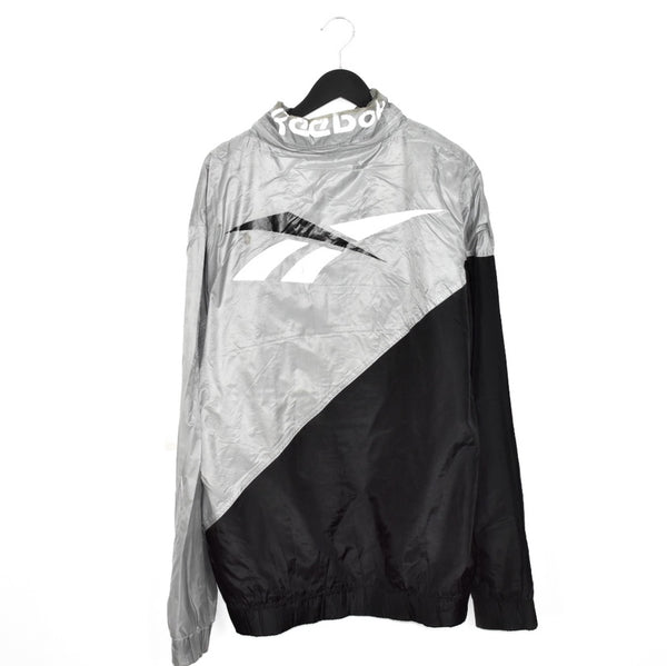 Vintage Reebok windbreaker zip up tracksuit track jacket trackie sweater jumper sweatshirt pullover long sleeve in grey and black