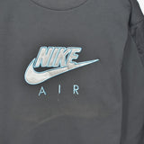 Vintage spell out Nike pullover sweatshirt windbreaker fleece track jacket in dark grey/blue