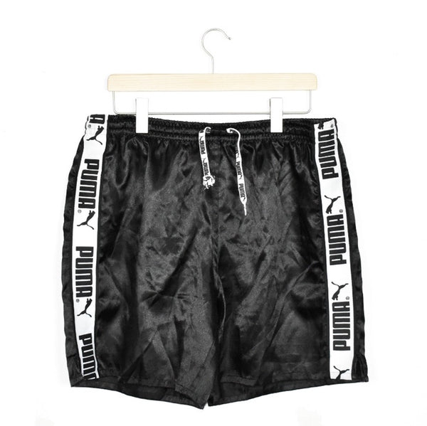 Vintage Puma shorts trousers joggers bottoms pants in black and white