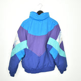 Vintage Sergio Tacchini puffer jacket windbreaker track jacket bomber jacket in blue purple and cyan