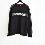 Vintage Reebok crewneck jumper pullover sweatshirt windbreaker fleece track jacket hoodie in black and white