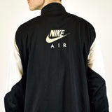Vintage Nike tracksuit track jacket fleece windbreaker in black and white