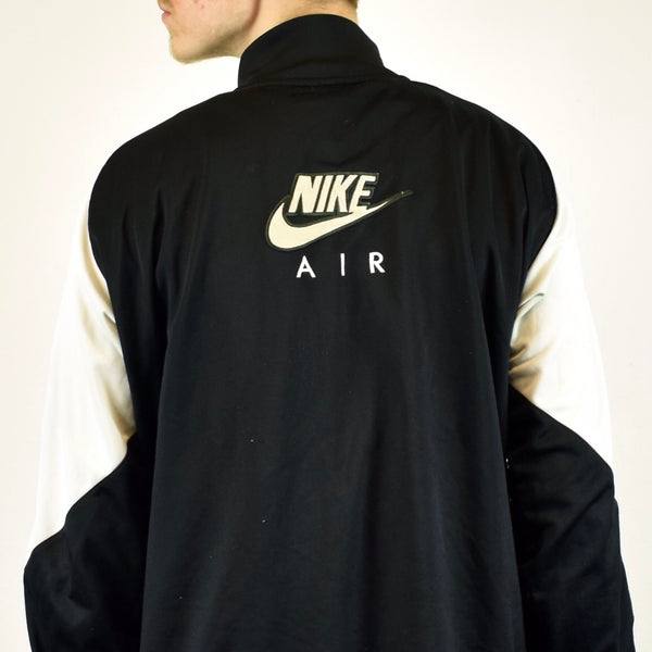 Vintage Nike tracksuit track jacket fleece windbreaker in black and white