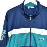 Vintage Reebok tracksuit trackie jacket zip up sweater in cyan and dark blue