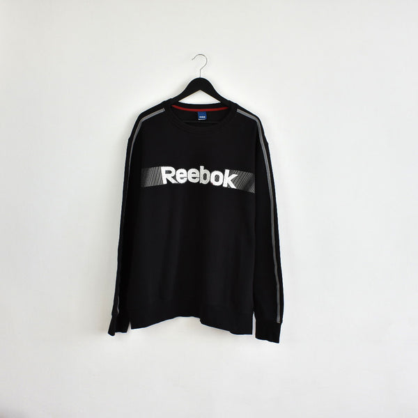 Vintage Reebok crewneck jumper pullover sweatshirt windbreaker fleece track jacket hoodie in black and white