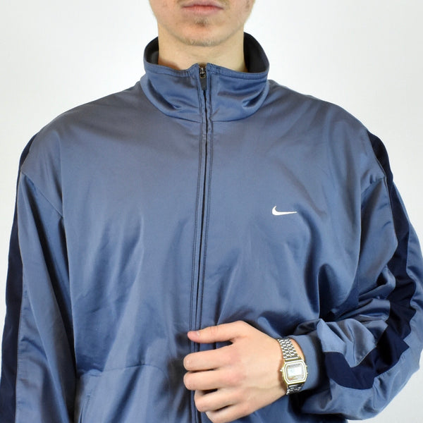Vintage Nike tracksuit track jacket fleece windbreaker in light blue and navy blue
