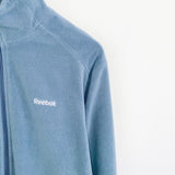 Vintage Reebok fleece zip up track jacket windbreaker sweatshirt longsleeve tee pullover jumper in light blue