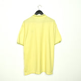 Vintage Umbro polo shirt t-shirt pullover in yellow