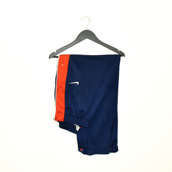 Vintage Nike track pants tracksuit bottoms in blue and red