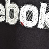 Vintage Reebok crewneck jumper pullover sweatshirt windbreaker fleece track jacket hoodie in black and white