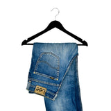 Vintage Lee ripped jeans in light blue