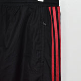 Vintage Adidas track pants trousers bottoms pants trousers in black and red