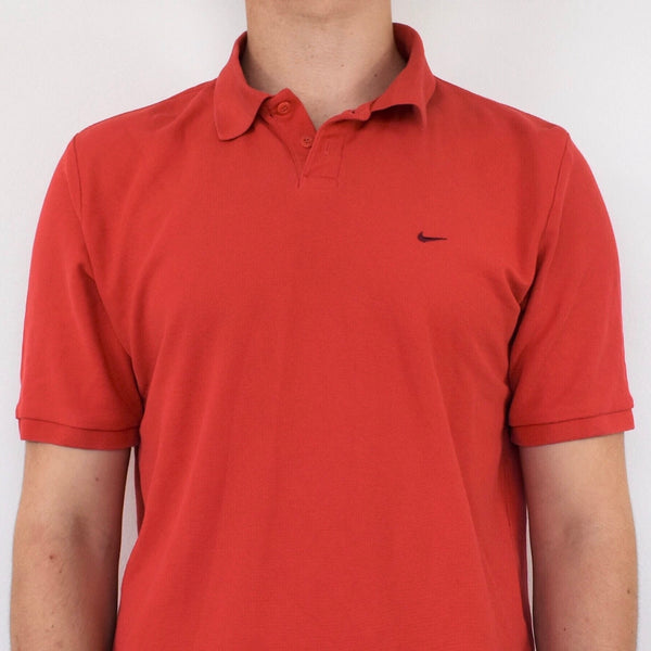 VINTAGE ORANGE NIKE POLLO SHIRT WITH EMBROIDERY ON THE BACK