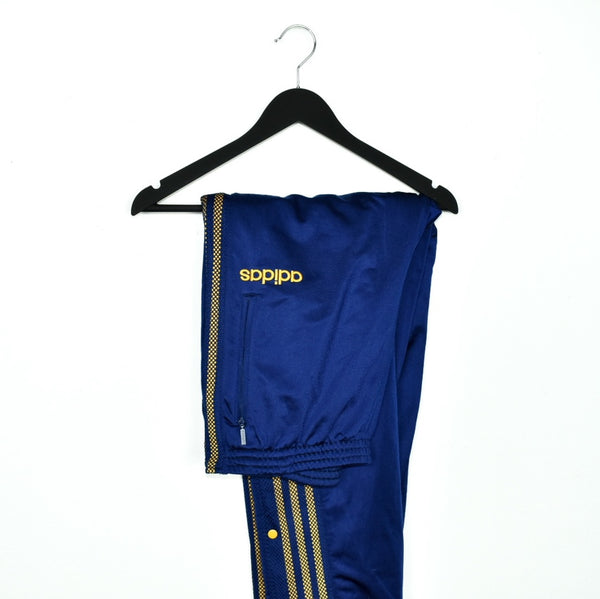 Vintage Adidas track pants tracksuit bottoms joggers trousers in blue and yellow